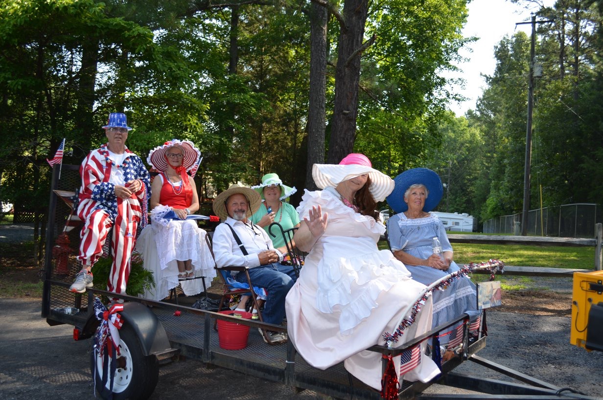 A group of people taking part in July 4th Parade